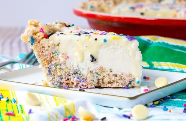 This whimsical ice cream pie recipe is perfect for any summer party - kids will love the sprinkles and adults will love the vanilla beans and white chocolate ganache. Get the recipe on RachelCooks.com!