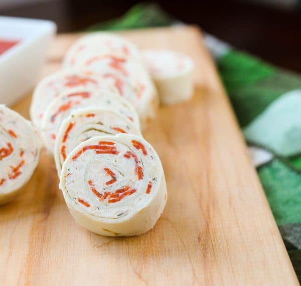 These pepperoni pizza tortilla pinwheels make a fun appetizer or school lunch. Your kids will think they have hit the jackpot when they open their lunchbox! Get the easy make-ahead recipe on RachelCooks.com!