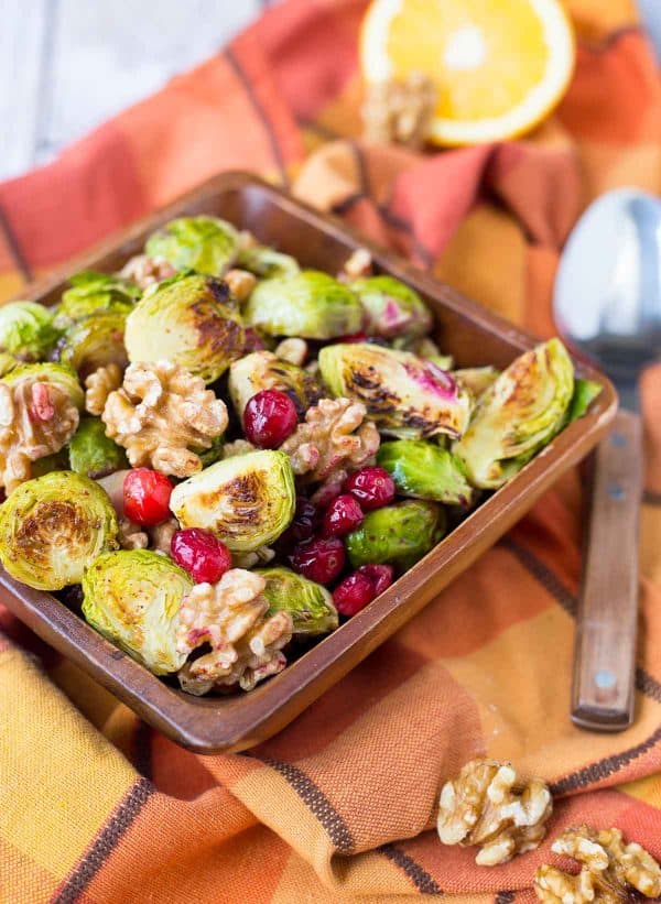 These Brussels Sprouts with Cranberries and Walnuts will be the perfect addition to your Thanksgiving or Christmas table. They are simple, festive, and delicious! Get the easy recipe on RachelCooks.com! 