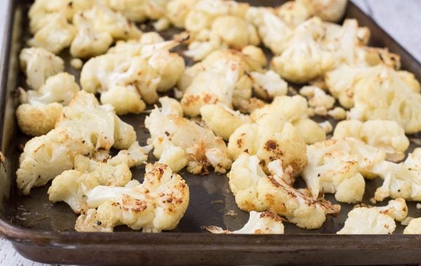 Parmesan roasted cauliflower on a sheet pan.