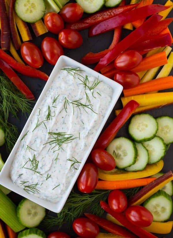 This skinny dill vegetable dip is a staple in our fridge -- we're hardly ever without it! You won't want to stop snacking on vegetables when you're dipping them in this healthy and low-cal dip. 