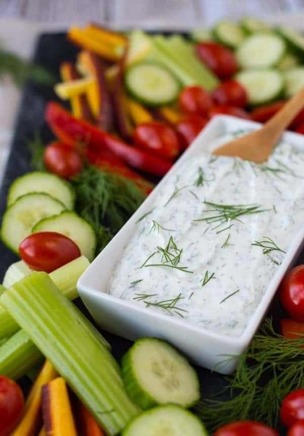 This skinny dill vegetable dip is a staple in our fridge -- we're hardly ever without it! You won't want to stop snacking on vegetables when you're dipping them in this healthy and low-cal dip. 