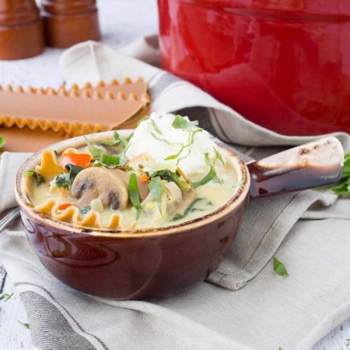 This vegetarian lasagna soup is creamy, comforting and packed full of vegetables. It's all made in one pot and is the perfect soup for a cold day. Get the soup recipe on RachelCooks.com!
