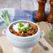 Extra filling and extra flavorful, this turkey quinoa chili is the perfect quick and easy weeknight meal -- and it freezes well! Get the healthy chili recipe on RachelCooks.com!