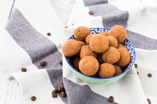 These chocolate protein balls will satisfy you chocolate cravings without a sugar crash later and will give you energy to get through your afternoon! Get the easy snack recipe on RachelCooks.com!