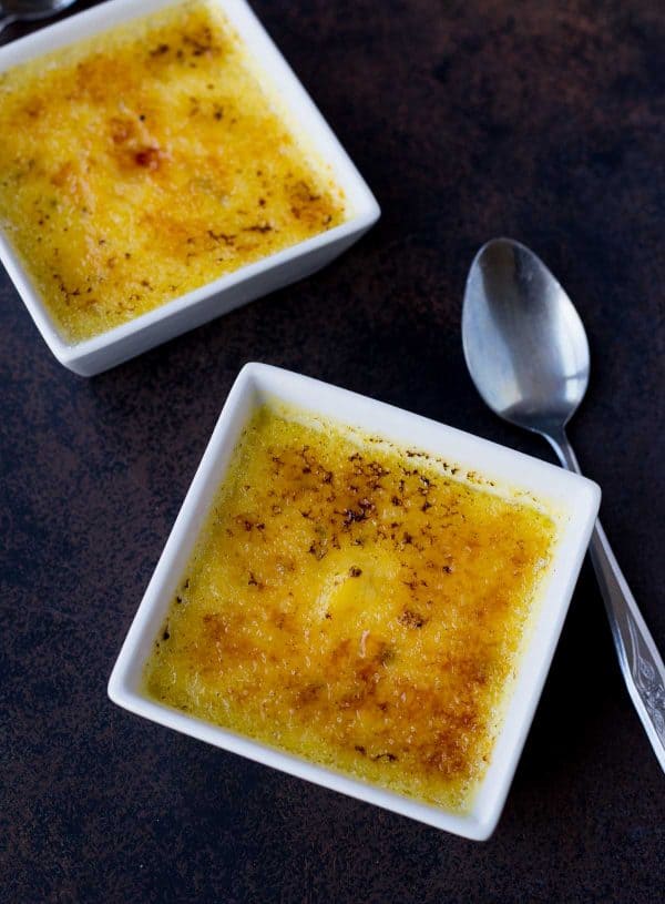 This easy Crème Brûlée really is the easiest -- made in the slow cooker so it's nearly hands-off! Best part? It makes only two - built in portion control! Get the easy dessert recipe on RachelCooks.com!