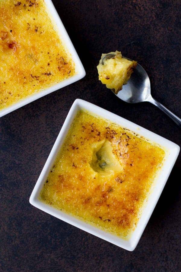 This easy Crème Brûlée really is the easiest -- made in the slow cooker so it's nearly hands-off! Best part? It makes only two - built in portion control! Get the easy dessert recipe on RachelCooks.com!