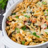 Baked pasta in white oval casserole dish.