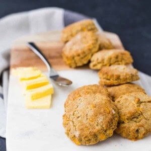 Whole wheat biscuits are flaky and decadent, like you'd expect. What's unexpectedly delicious is the crunch of cornmeal and flavor of cheddar and pepper. Get the easy recipe on RachelCooks.com!