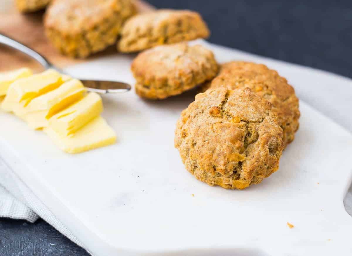 Front view of whole wheat biscuits and butter.