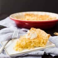 The easiest Coconut Custard Pie recipe -- if I can do it so can you! No prebaking the crust required! This pie recipe will immediately become a favorite! Get the easy pie recipe on RachelCooks.com!