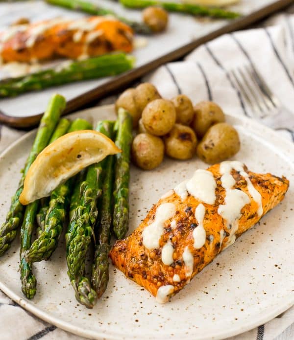 This Salmon and Asparagus Sheet Pan Dinner with Potatoes is the easiest dinner thanks to a delicious shortcut! Even if you're intimidated by cooking fish, you can handle this recipe! Get the recipe on RachelCooks.com!