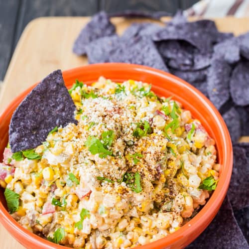 This Mexican Corn Dip has all the flavors of Mexican Street Corn in an irresistible dip format, that you can actually feel good about eating! Get the recipe on RachelCooks.com!
