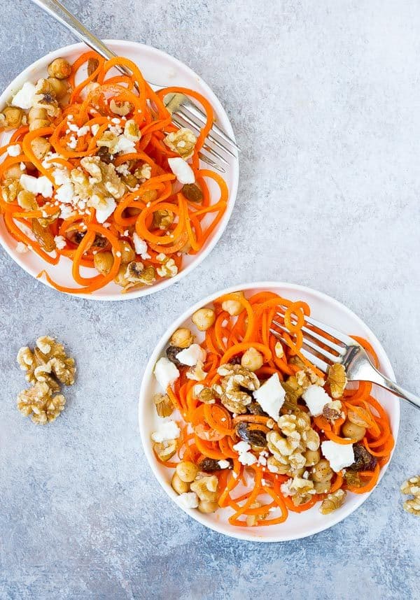 This Moroccan Carrot Noodle Salad with Chickpeas, Feta and Walnuts is flavorful, full of nutrients, and hearty enough to be a full meal! You're going to love this one! Get the recipe on RachelCooks.com!