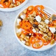 This Moroccan Carrot Noodle Salad with Chickpeas, Feta and Walnuts is flavorful, full of nutrients, and hearty enough to be a full meal! You're going to love this one! Get the recipe on RachelCooks.com!