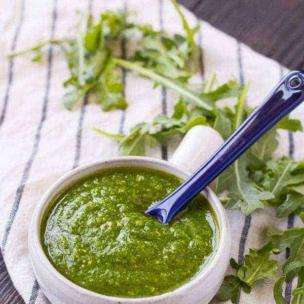 Switch up your pesto game with this arugula pesto. It's great on pasta, pizza, and so much more!  Get the pesto recipe on RachelCooks.com!