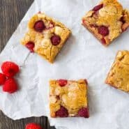 Ultra-moist raspberry white chocolate blondies are absolutely irresistible. You won't believe how easy they are to make! Get the recipe on RachelCooks.com!