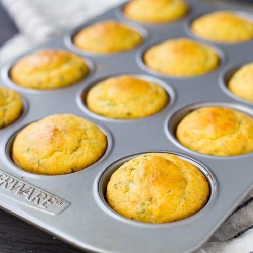 This Cornbread Muffin Recipe with Herbs and Cheddar takes your standard corn muffins up a notch thanks to flavorful herbs and rich, sharp cheddar. They're perfect with a bowl of chili!