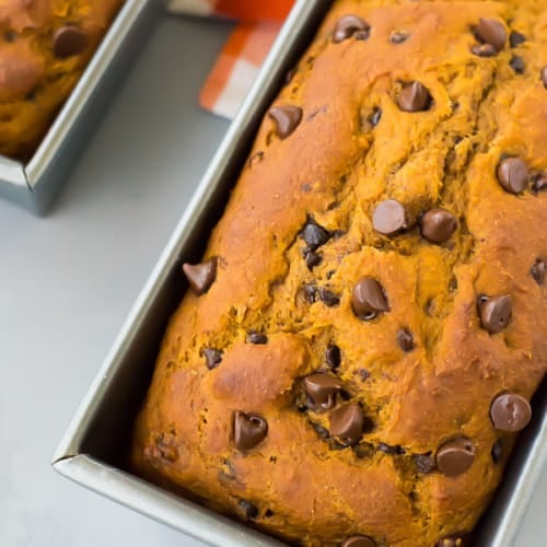 Made in one bowl, this healthy pumpkin chocolate chip bread is moist and decadent but full of whole grains and natural sweetness. Get the healthy pumpkin bread recipe on rachelcooks.com!