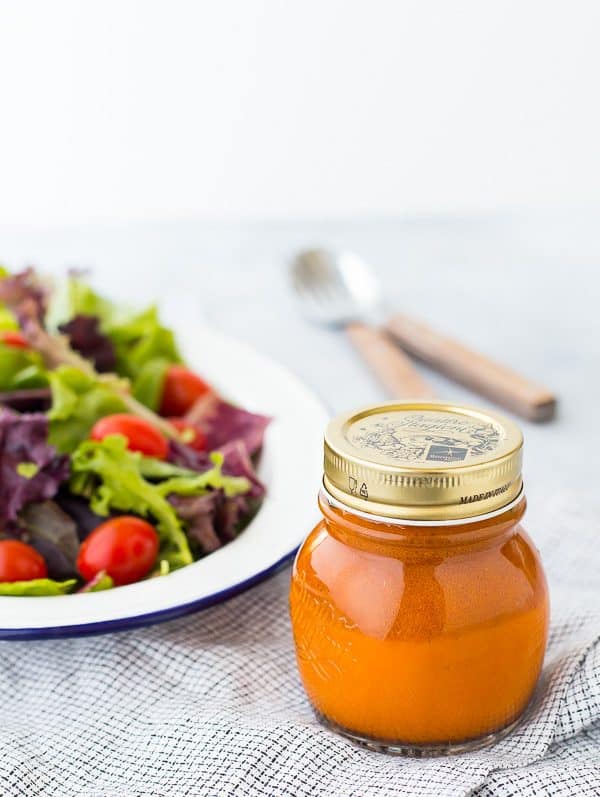 Sweetened and flavored with carrot juice, this vinaigrette salad dressing is free of added sugars but not short on flavor! It's great on salads with southwestern toppings! Get the recipe on RachelCooks.com!