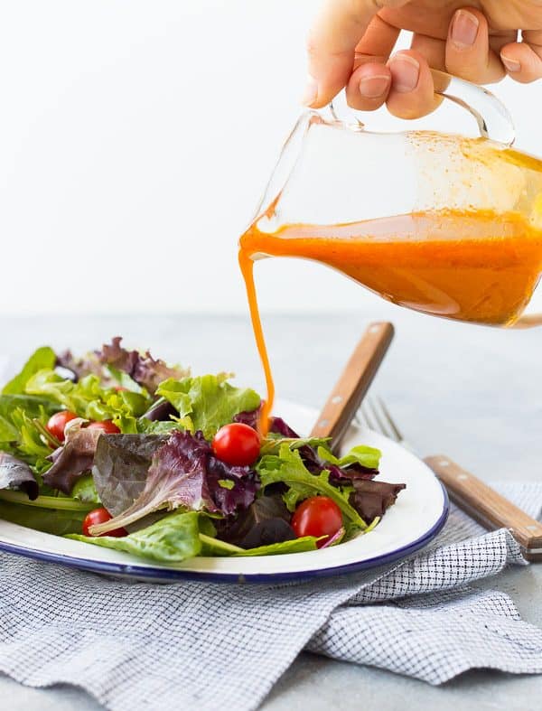 Sweetened and flavored with carrot juice, this vinaigrette salad dressing is free of added sugars but not short on flavor! It's great on salads with southwestern toppings! Get the recipe on RachelCooks.com!