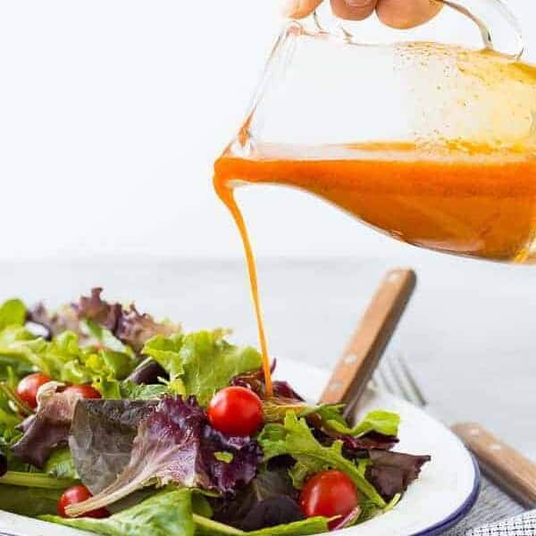 Sweetened and flavored with carrot juice, this vinaigrette salad dressing is free of added sugars but not short on flavor! It's great on salads with southwestern toppings! Get the recipe on RachelCooks.com!