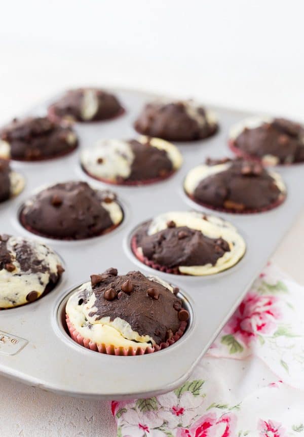 Can you think of a better way to start your day than with a decadent chocolate muffin with ribbons of cream cheese running through it? These chocolate cream cheese muffins make for happy, happy mornings! Get the recipe on RachelCooks.com!