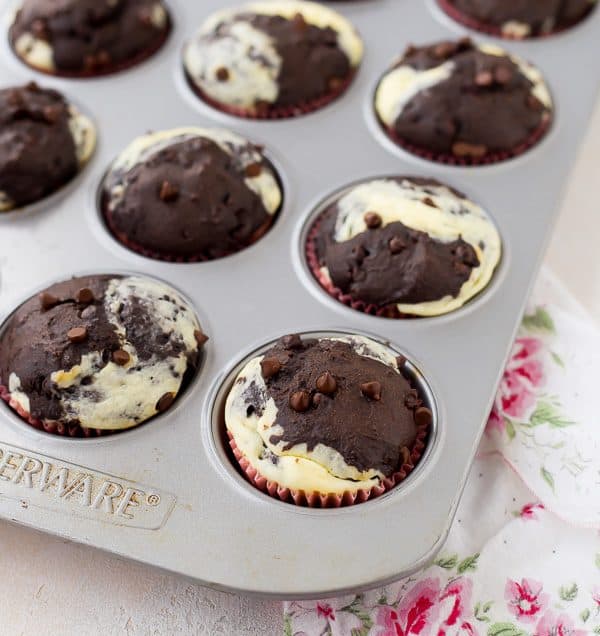 Can you think of a better way to start your day than with a decadent chocolate muffin with ribbons of cream cheese running through it? These chocolate cream cheese muffins make for happy, happy mornings! Get the recipe on RachelCooks.com!