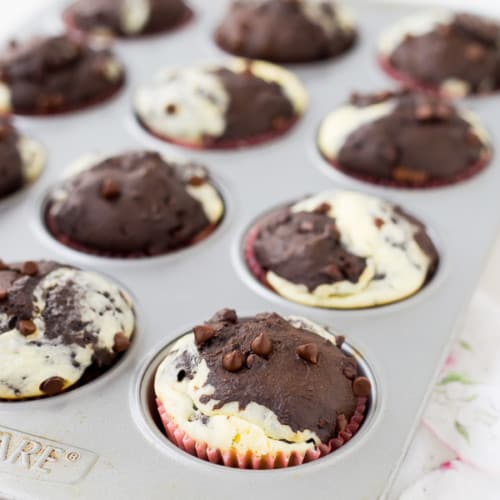 Can you think of a better way to start your day than with a decadent chocolate muffin with ribbons of cream cheese running through it? These chocolate cream cheese muffins make for happy, happy mornings! Get the recipe on RachelCooks.com!