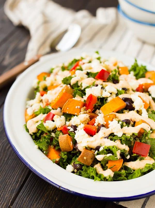 Filling and flavorful, this kale sweet potato salad is filled with southwestern flavors and nutritious ingredients! It's great for meal prepping and healthy eating all week long. Get the recipe on RachelCooks.com!