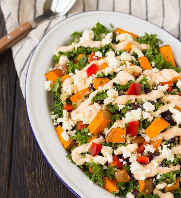 Filling and flavorful, this kale sweet potato salad is filled with southwestern flavors and nutritious ingredients! It's great for meal prepping and healthy eating all week long. Get the recipe on RachelCooks.com!