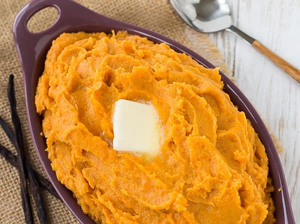 Creamy and sweet, these vanilla bean mashed sweet potatoes taste like dessert! They're so easy to make and will become a quick favorite! Get the recipe on RachelCooks.com!