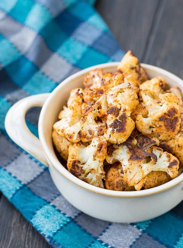 Roasted Cauliflower with Chili Powder is absolutely perfect on its own but it's also an ideal addition to salads and burrito bowls. You might even find yourself reaching for the chili powder every time you roast cauliflower! Get the recipe on RachelCooks.com!
