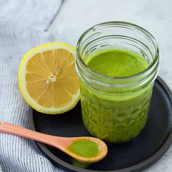 Bright and fragrant, this lemon basil vinaigrette dressing is the perfect healthy salad dressing. It's Whole30 compliant and is a great addition to a green tossed salad or a pasta salad. It's also great drizzled on top of grilled chicken! Get the easy salad dressing recipe on RachelCooks.com!