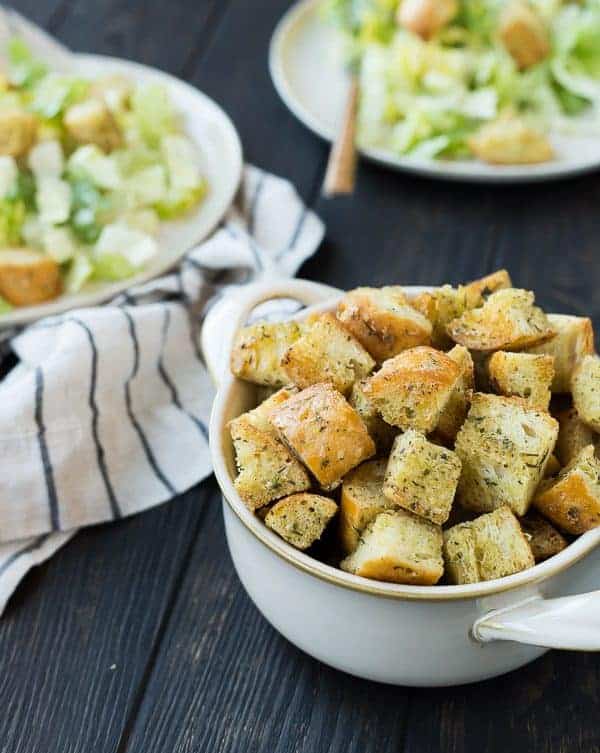 Caesar Croutons are the crowning jewel on a classic Caesar Salad and once you make this homemade version, you'll find yourself wondering why you ever bought croutons from the store. There is no comparison and they'll quickly take your Caesar Salad game to the next level. Get the recipe on RachelCooks.com!