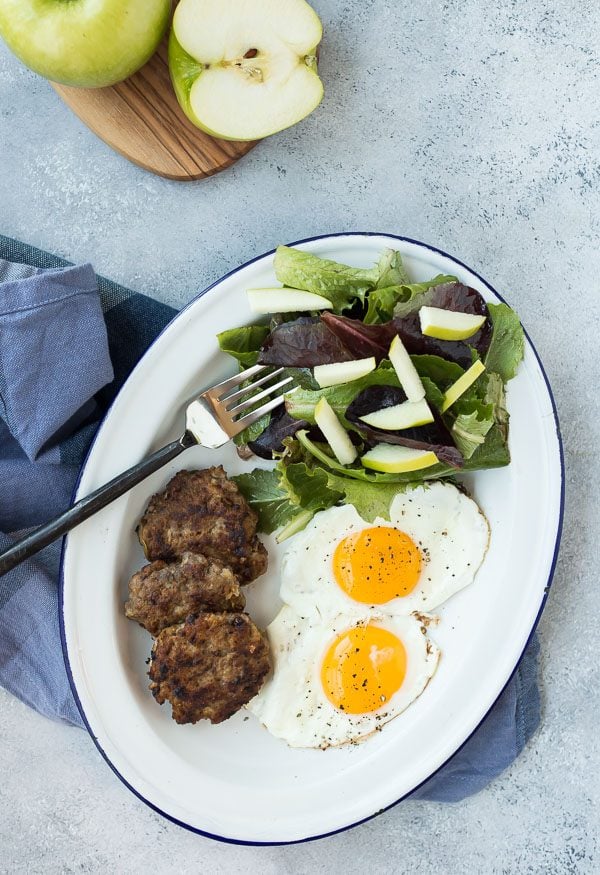 Even if you're not doing a Whole30, this Whole30 Sausage is a breakfast WIN! It's full of flavor and protein and it's super easy to make thanks to a couple shortcuts. You'll be so happy to know exactly what's going into your breakfast sausage! Get the paleo sausage recipe on RachelCooks.com!