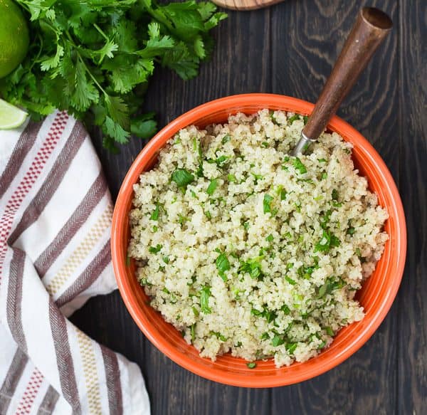 Instant Pot Quinoa is so quick and easy to make, plus it's nearly hands-off! You will love this method of cooking quinoa if you're a pressure cooker user. Try it today! Get the recipe for cilantro lime quinoa on RachelCooks.com!