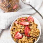 Chocolate Chip Granola Image with Strawberries and Spoon