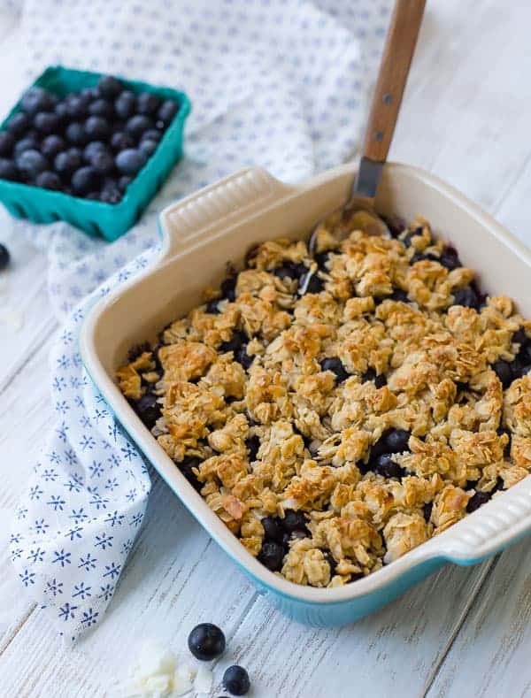 image of blueberry crisp in a blue dish