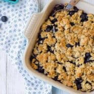 This blueberry crisp with coconut is a fun and delicious twist on plain blueberry crisp - you'll love the additional layer of crisp and the flavor that the coconut adds. The only question is, will you eat it for breakfast or dessert?