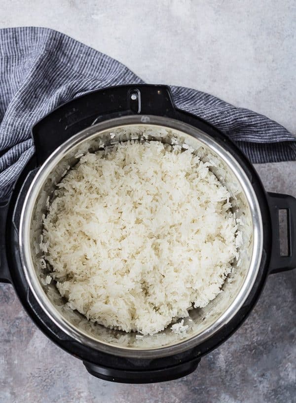 Overhead of Instant Pot containing cooked rice.