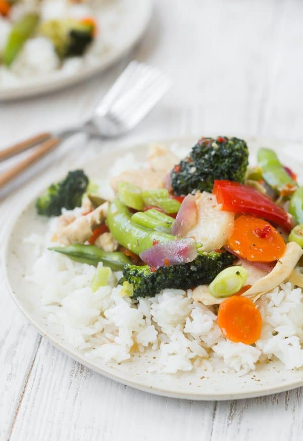 Front view of plated chili chicken stir fry.