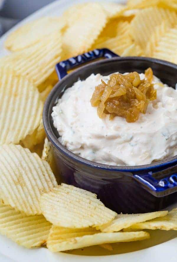 image of homemade french onion dip surrounded by chips