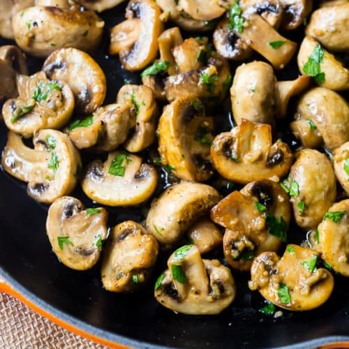 Sautéed Mushrooms swimming in a silky garlic butter sauce...these are mushroom perfection! They are great on steak, chicken, or as a side dish.