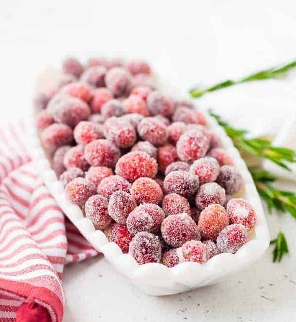 Whether you call them sugared cranberries or candied cranberries, they're the perfect sparkling garnish to nearly any holiday dish or cocktail. They're great on their own, too! 