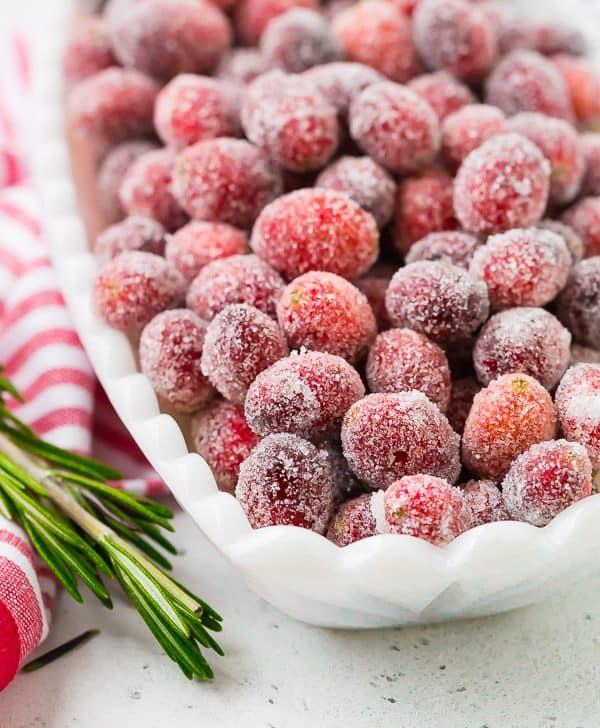 Whether you call them sugared cranberries or candied cranberries, they're the perfect sparkling garnish to nearly any holiday dish or cocktail. They're great on their own, too! 