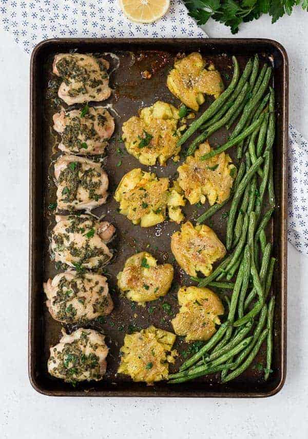 Overhead of prepared sheet pan chicken dinner.