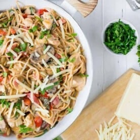 This creamy chicken spaghetti is made in one pan and is endlessly versatile. It's a great clean-out-the-fridge meal! 