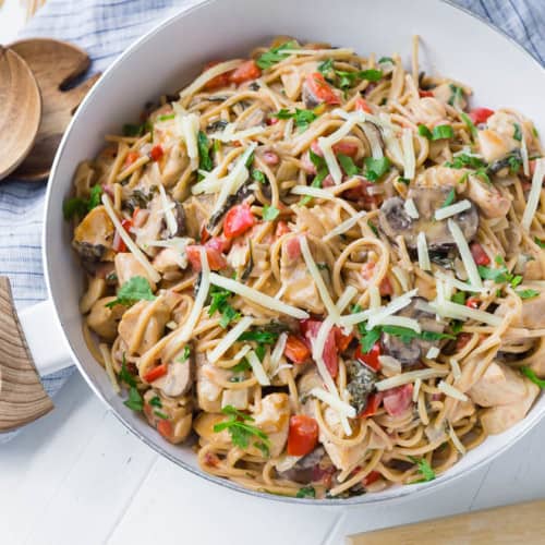 This creamy chicken spaghetti is made in one pan and is endlessly versatile. It's a great clean-out-the-fridge meal! 