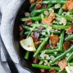 A match made in heaven, these green beans with bacon are completely irresistible. They very well might be your new favorite green bean recipe! 